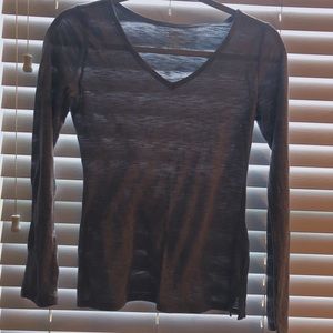 A casual grey long sleeve top